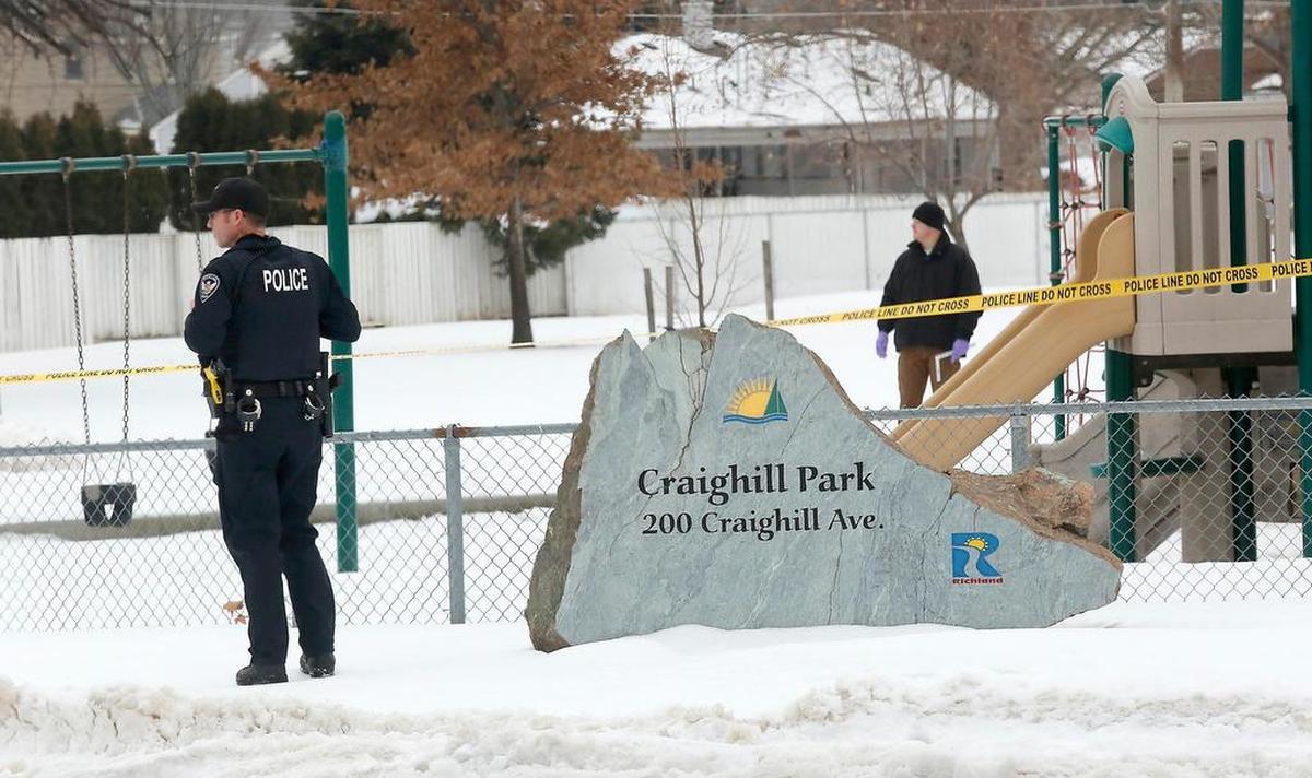 Richland patrol officers and detectives at the scene of Tuesday morning’s stabbing at Craighill Park in Richland. Watch a video at: tricityherald.com/video