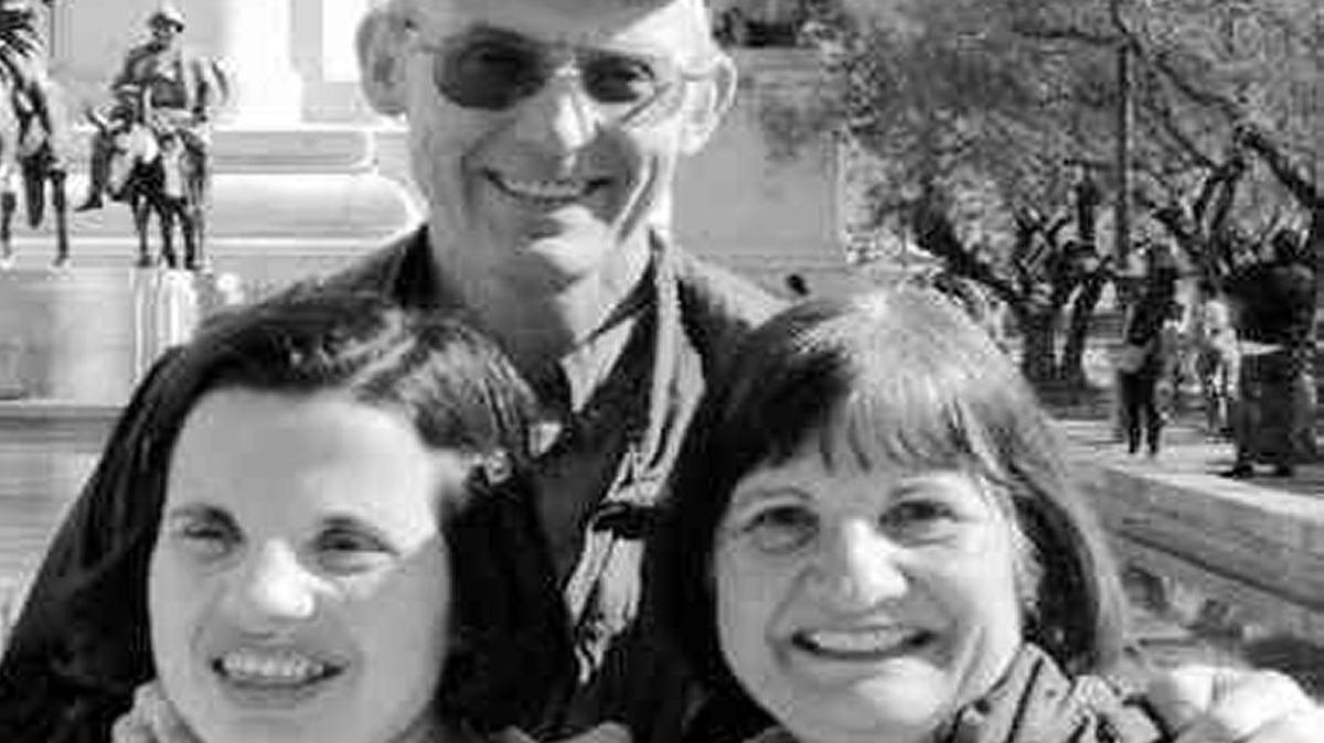 Doug Brown with disabled daughter Carmina, left, and wife Elena.