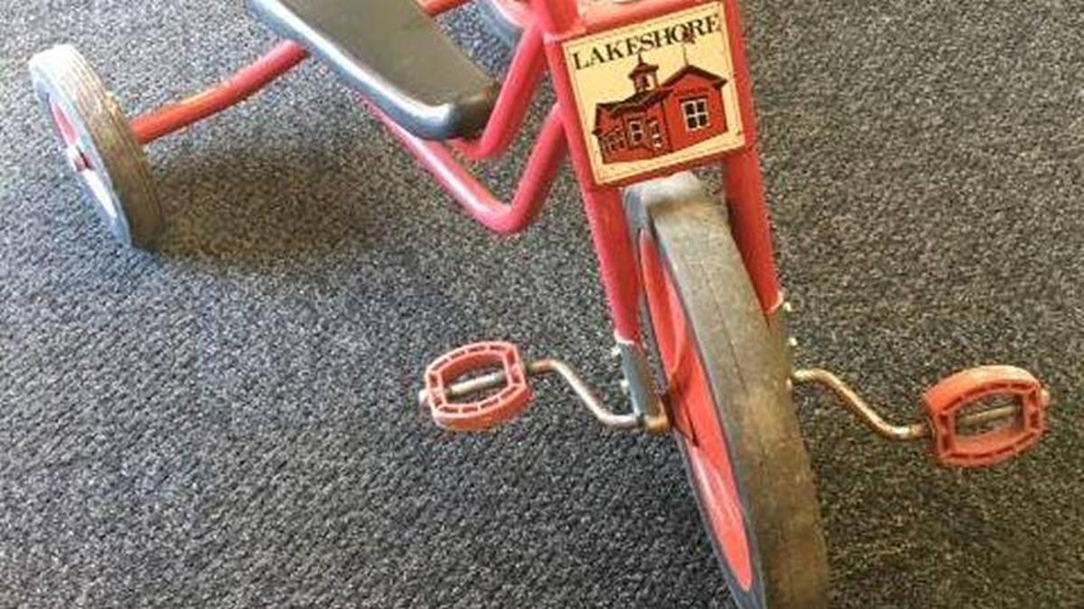 A tricycle stolen from Keewaydin Discovery Center was returned to the school Thursday. A juvenile suspect faces charge for the theft.