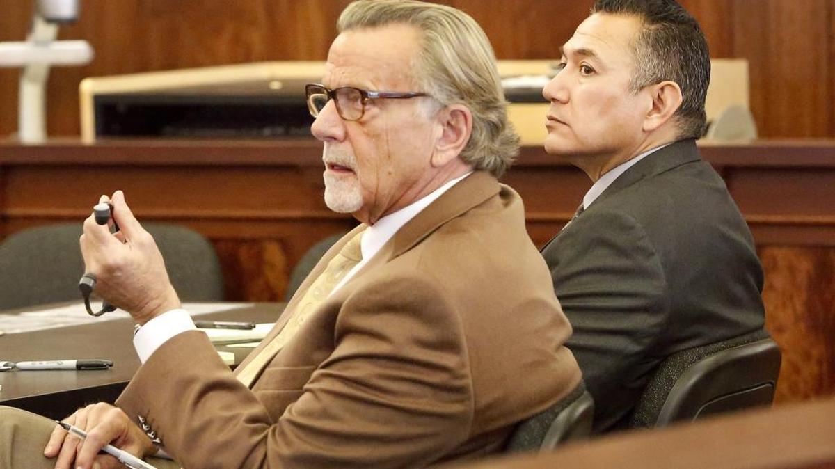 Defendant Richard J. Aguirre, right, and his defense attorney, John Henry Browne.