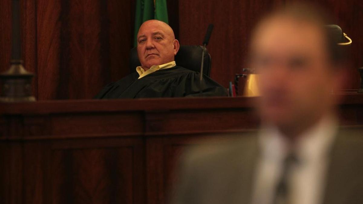 Franklin County Coroner Dan Blasdel listens as Franklin County Prosecutor Steve Lowe addresses the coroner’s inquest jury in this 2006 file photo. Columbia Basin College in Pasco will be the site for the coroner’s inquest into the Antonio Zambrano-Montes shooting.