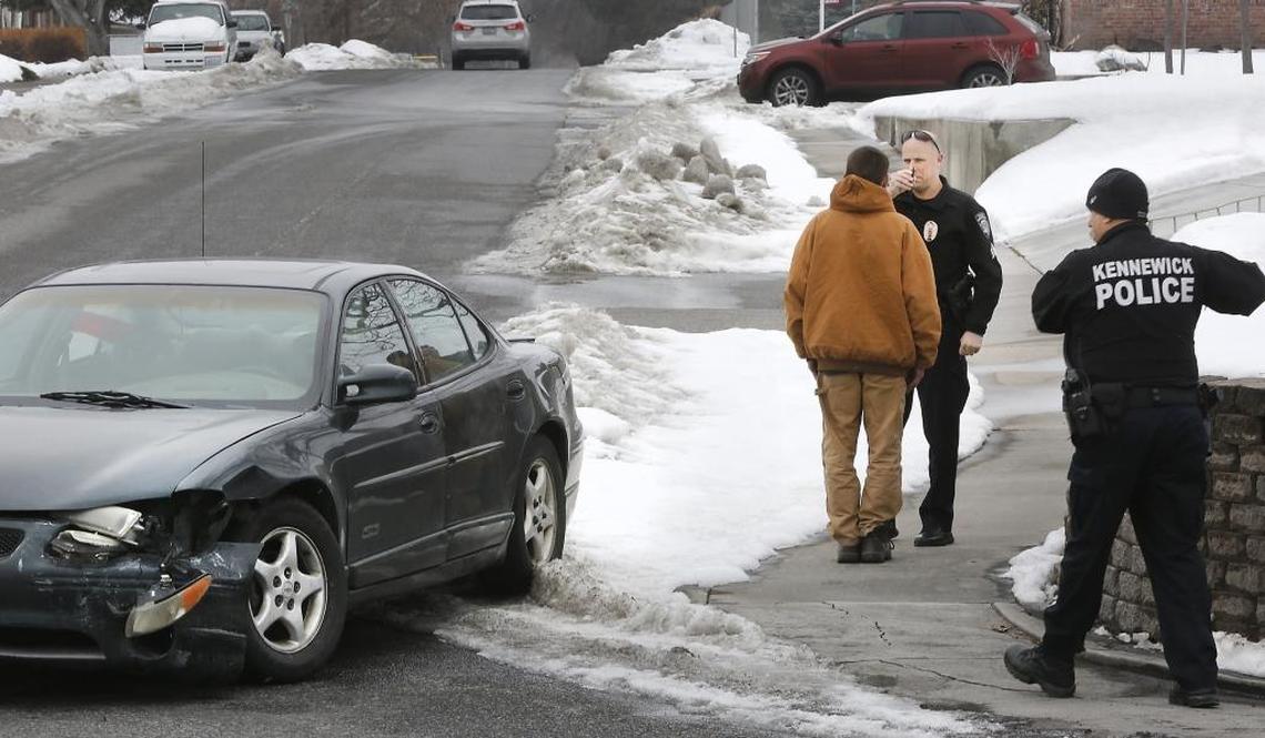 Kennewick police Sgt. Matt Newton performs a field sobriety test on David Rae of Connell after he was involved in a two-car collision Jan. 25 on Canal Drive in Kennewick. Investigators claim his blood-alcohol level was almost three times above the legal limit to drive.