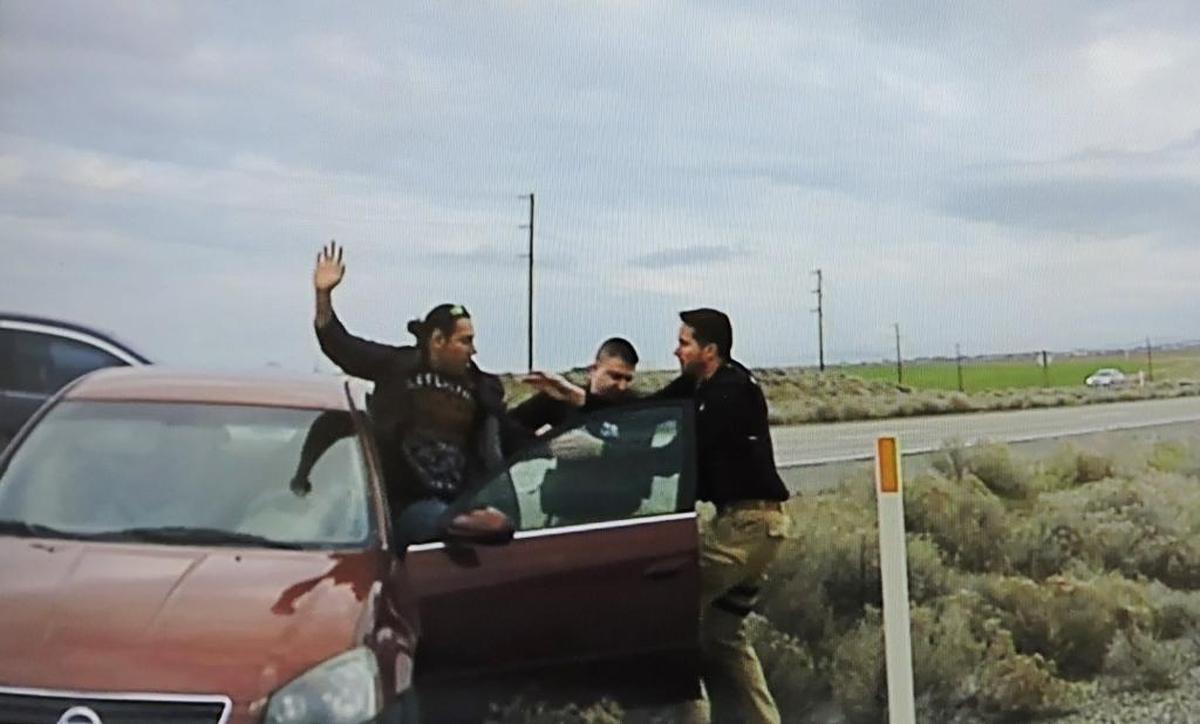 Pasco police on Wednesday pull Richard Vasquez out of a Nissan Altima on Interstate 82.