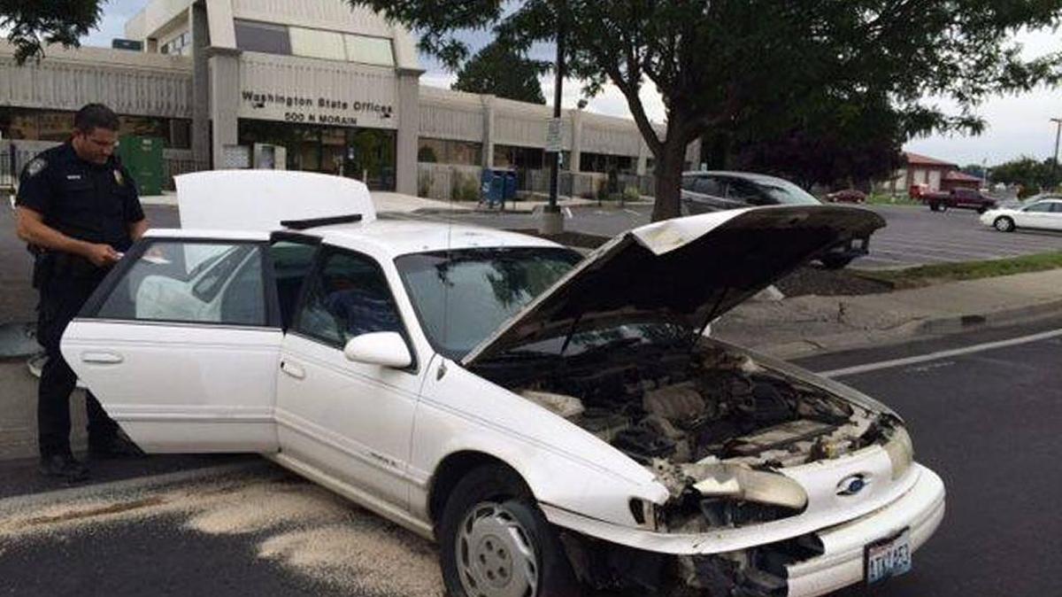 Kennewick police say Alan Ridgway crashed this car into a fire hydrant and fled, only to return shortly after to retrieve a bag of methamphetamine.