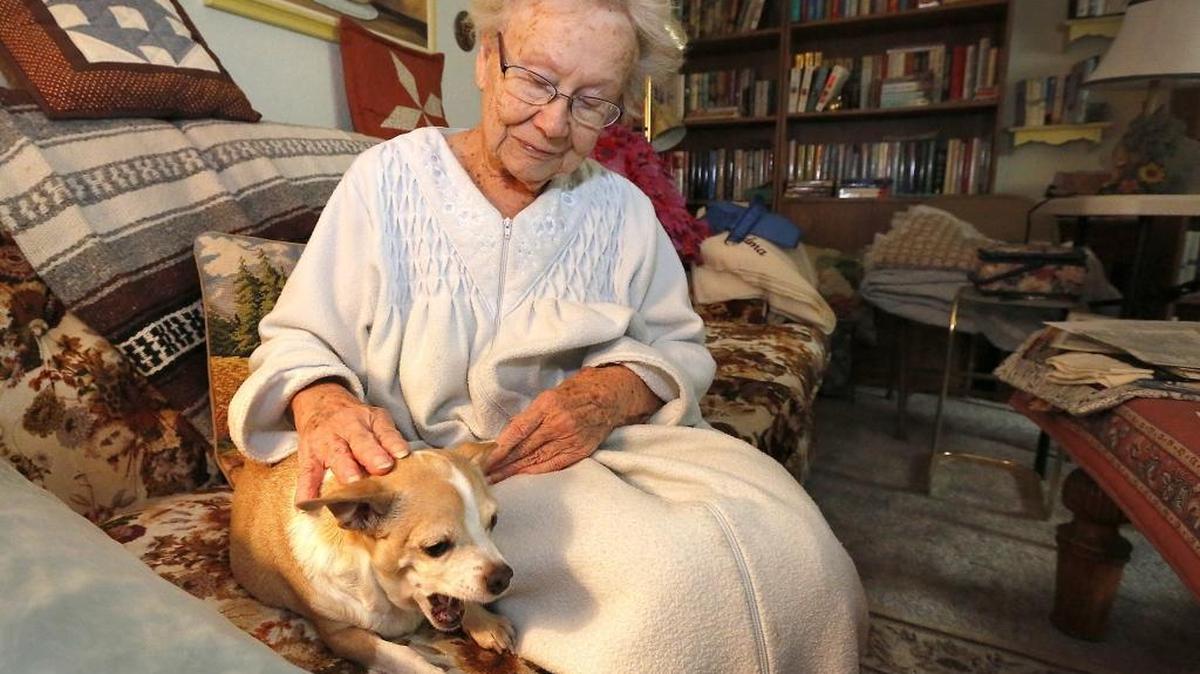 Kidnapping victim Hazel Abel, 86, sits Friday with her faithful companion Tessa, an 8-year-old Chihuahua, in the living room of her Kennewick home.