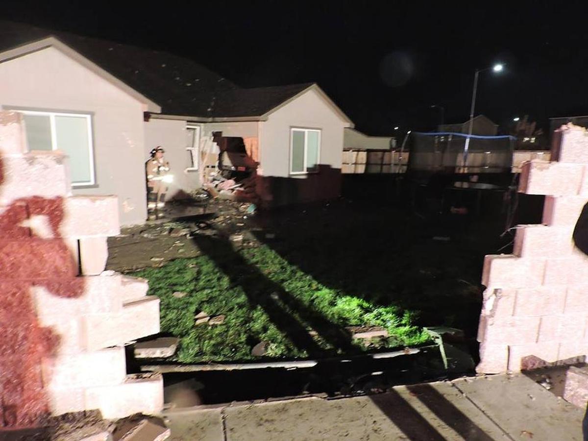 A Pasco man died after his truck went off the road and through a home near Convention Drive and Sandifur Parkway.