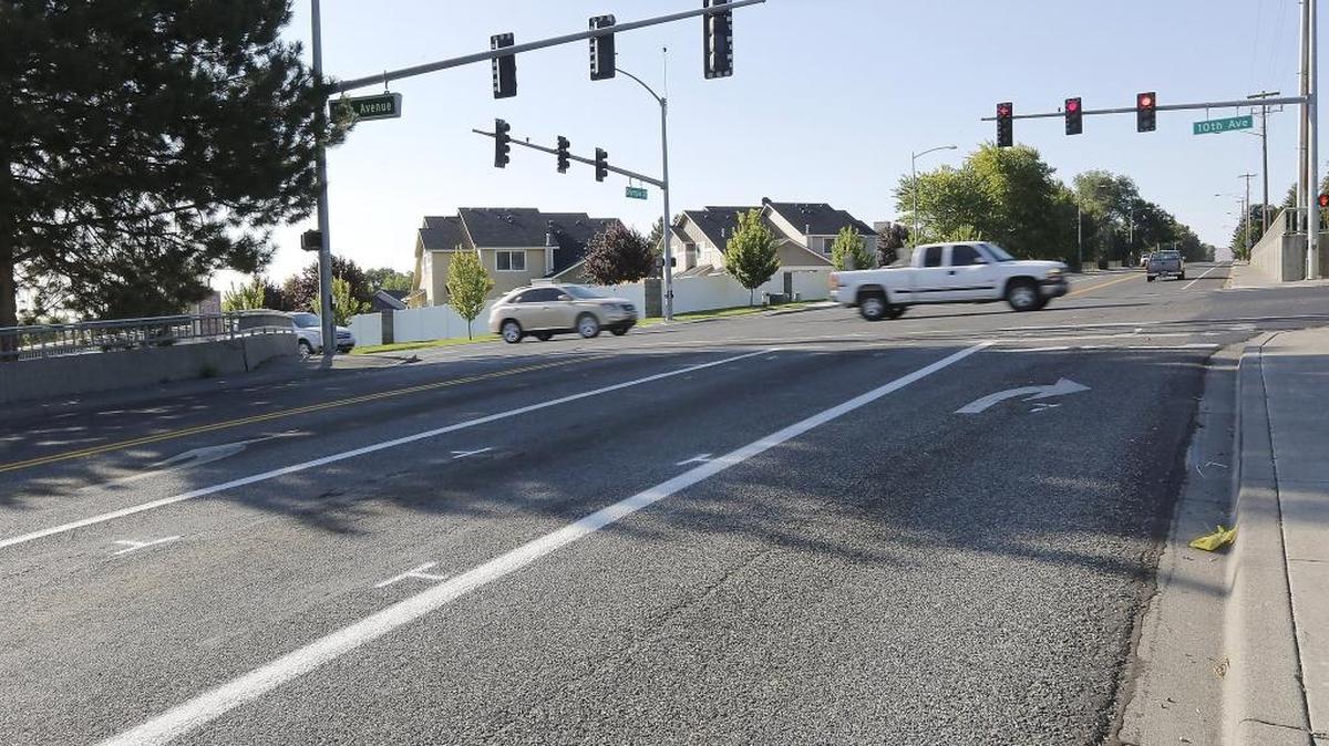 Investigative paint markings are visible at the intersection of South Olympia Street and West 10th Avenue where two Kennewick police officers shot and killed a man with a sword after he reportedly attacked one of them the night before.