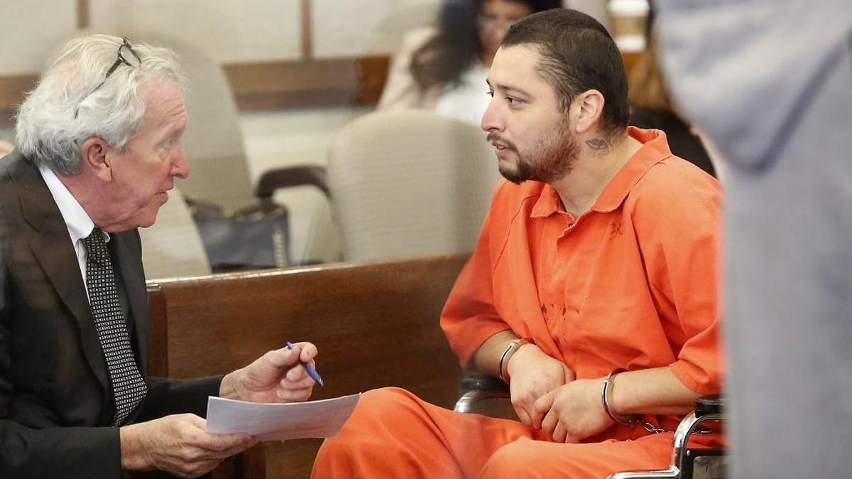 Edwin Espejo, right, confers with his attorney Gary Metro during a hearing on his attempted-murder charges. The charges stem from the Sept. 16 gunfight with Pasco police in the basement of his South Ninth Avenue home after officers responded to domestic violence call.