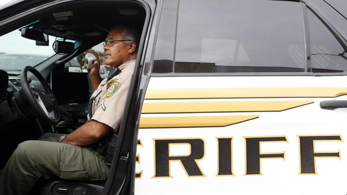 
Deputy Jim LeDoux of the Franklin County Sheriff’s Office uses a new duplex radio Monday while in his car in Pasco. The sheriff’s office recently received a grant for the new radios that will use both VHF and 800 megahertz radio channels.
