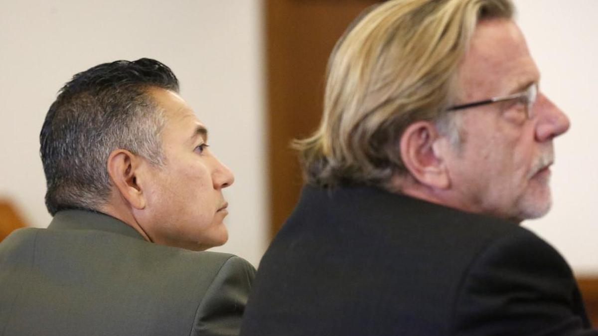 Richard J. Aguirre, 52, left, sits with his defense attorney, John Henry Browne, at the start of his rape trial Wednesday in Franklin County Superior Court.