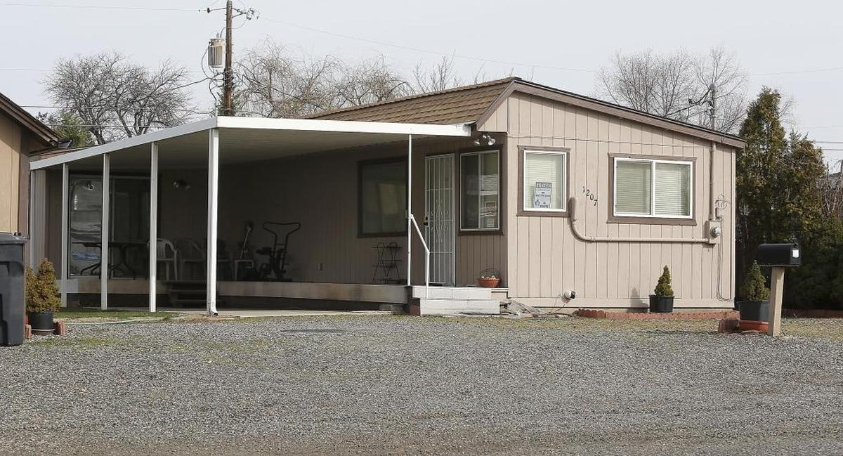 The home at 1207 W. Washington St. in Pasco where the body of Bonnie Ross, 82, was discovered by neighbors. Police suspect Hector Orozco Jr., 42, of the fatal stabbing. They also suspect him of stealing her car after he allegedly murdered Demetrius A. Graves.