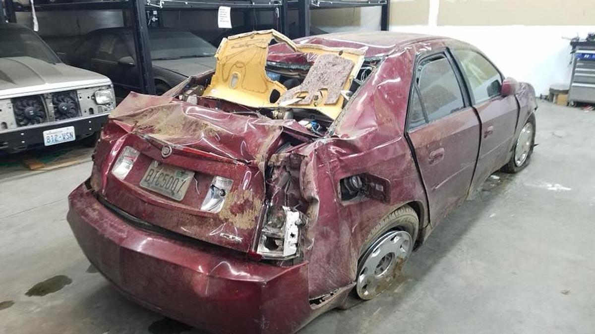 Franklin County deputies arrested a man who rolled his Cadillac at an intersection after fleeing officers.