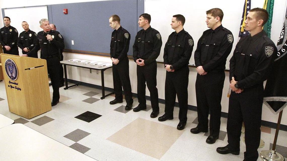 Kennewick Police Chief Ken Hohenberg introduces the department's five newest officers Monday during an Oath of Office ceremony at the police station. From left, they are: Tyler McMullen, Brandon Leander, Jason Vought, Joshua Freeland Krieg and Troy Perkins.