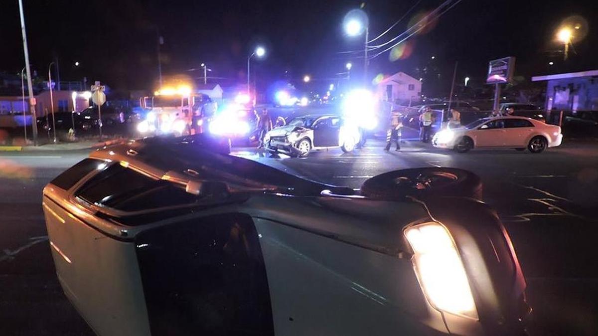 A Honda CRV ended up on its side early May 28 after the driver allegedly ran a stop sign and was hit by the Dodge Caliber seen in the background.