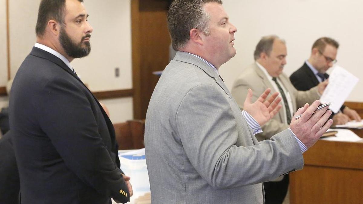 Chi Flores, left, and his attorney Scott Johnson have filed a motion to have his child molestation case dismissed, claiming the investigation has been hindered by threats from a deputy prosecutor. Flores’ trial in Franklin County Superior Court is scheduled to start Sept. 27.