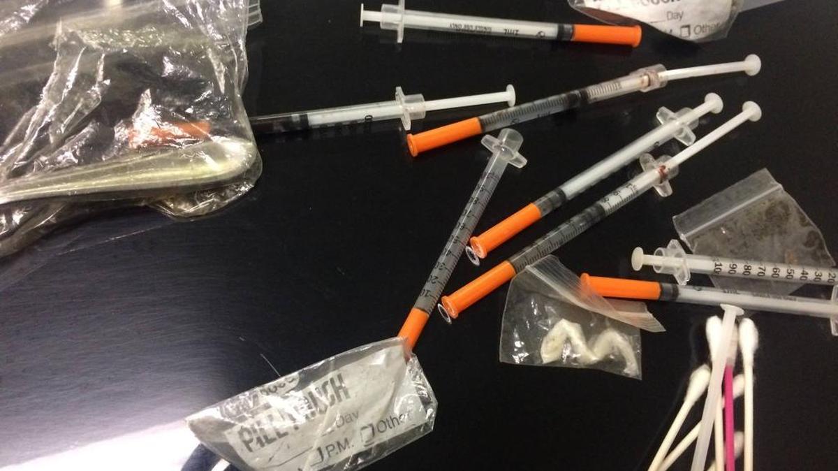 Syringes, heroin and methamphetamine were found inside an Acura after detectives searched the car on Thursday.
