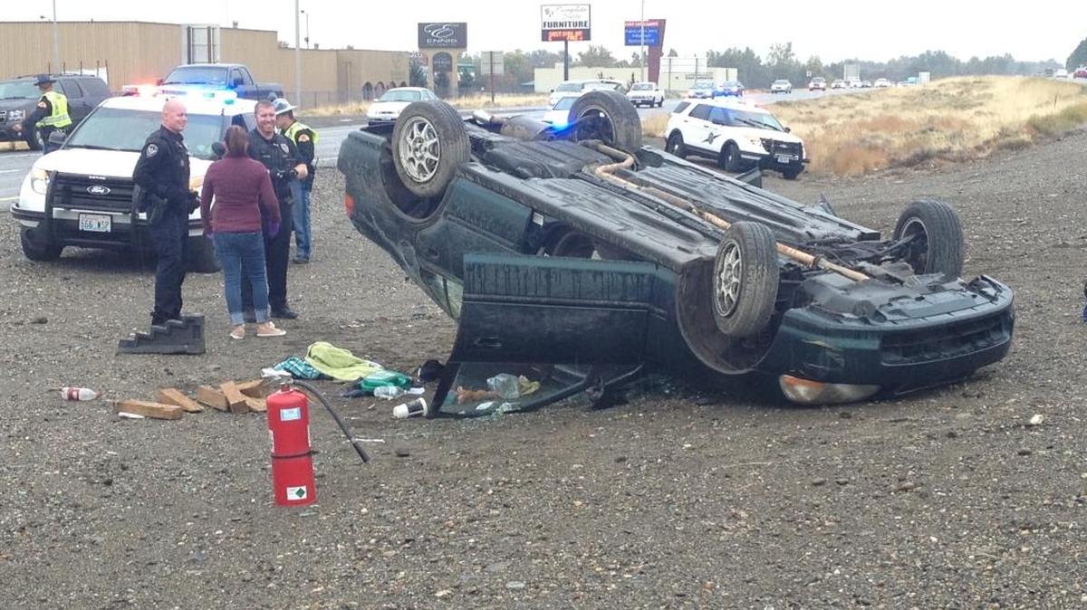 Two people were hurt when a car flipped about 12:30 p.m. Oct. 13 on Highway 240 near Columbia Center Boulevard. Traffic was backed up in the westbound lanes as emergency crews worked at the scene. The Washington State Patrol is investigating what happened.