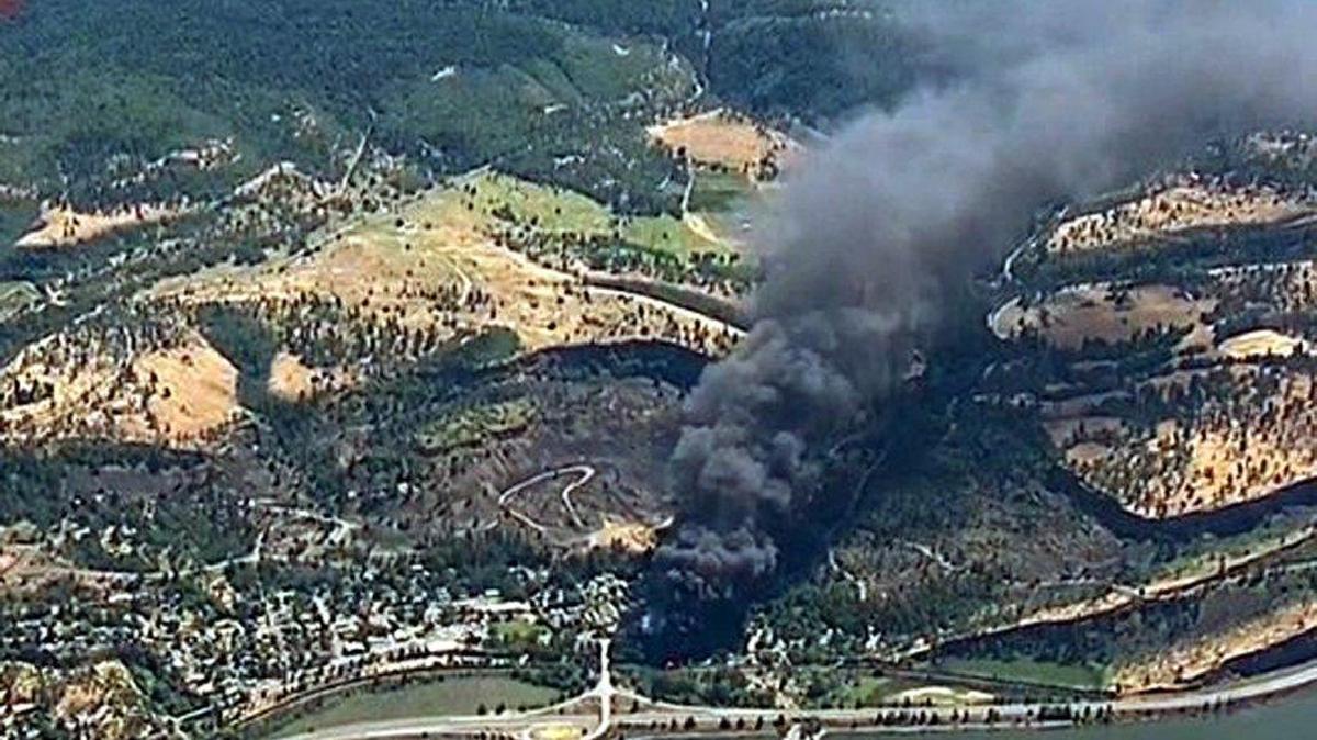 In this frame from video provided by KGW-TV, smoke billows from a Union Pacific train that derailed June 3 in Oregon's scenic Columbia River Gorge. The accident sparked a fire and an oil spill near the Columbia River.