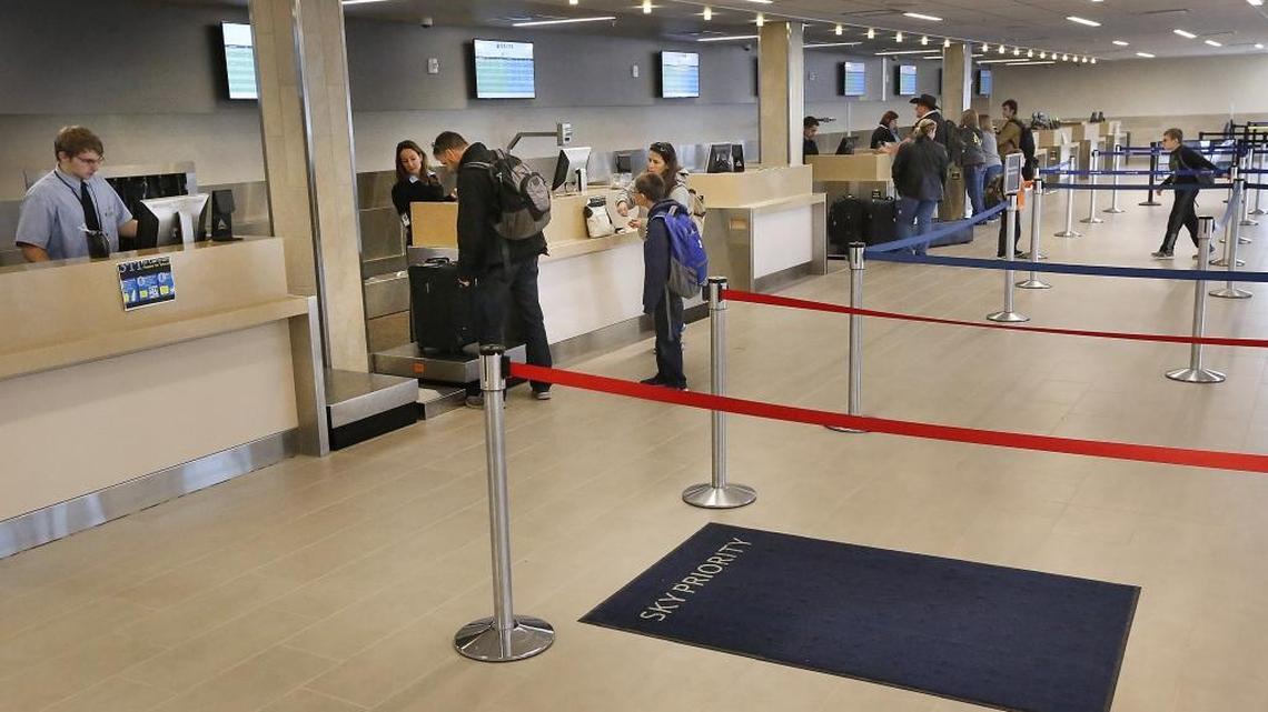Airline travelers check in Friday afternoon at the recently remodeled ticketing area at the Tri-Cities Airport in Pasco. The facility is undergoing a $41.9 million expansion and modernization project, scheduled to be completed in January. The check-in area is located in the same spot as before, but TSA equipment is now situated behind the walls. Watch a video at tricityherald.com/video