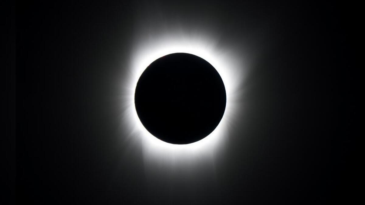 A total eclipse of the sun seen from the International Space Station.