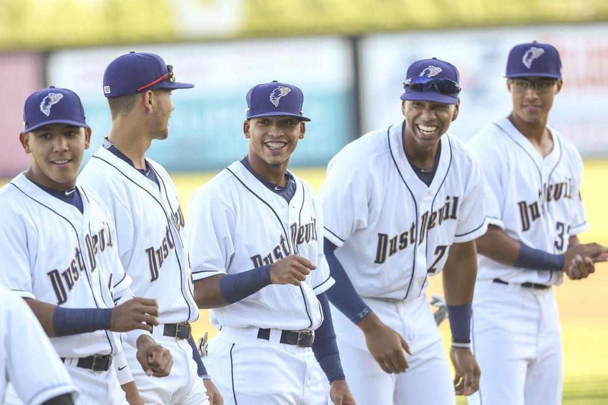 Members of the Dust Devils baseball team enjoy opening night festivities in 2017 at Gesa Stadium in Pasco.