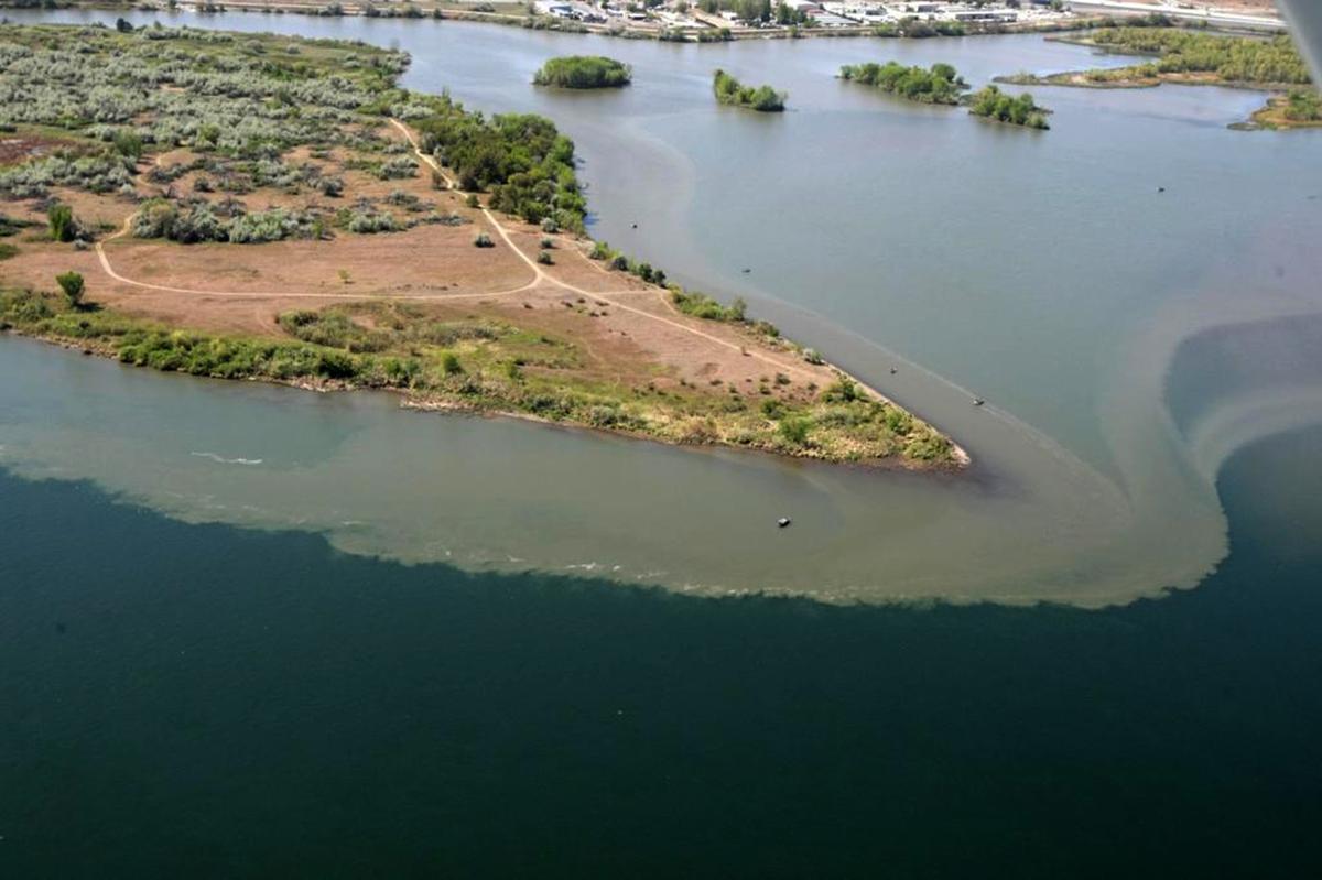 Spring runoff muddies the waters at Bateman Island in Richland where the Yakima and Columbia Rivers converge.