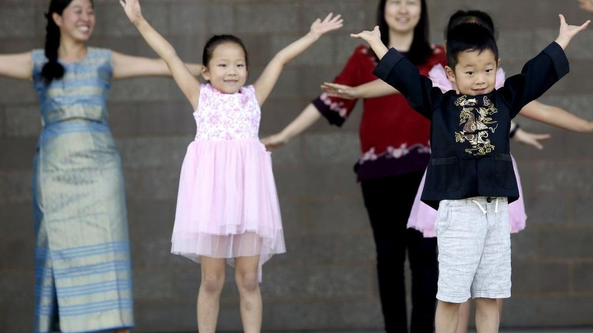 Dancers with the Tri-Cities Chinese folk group perform An Appointment with a Rainbow Saturday during the Richland Cultural Fair at John Dam Plaza. Numerous cultural groups performed on the HAPO Community Stage during the free event, which also featured food trucks and cultural exhibits.