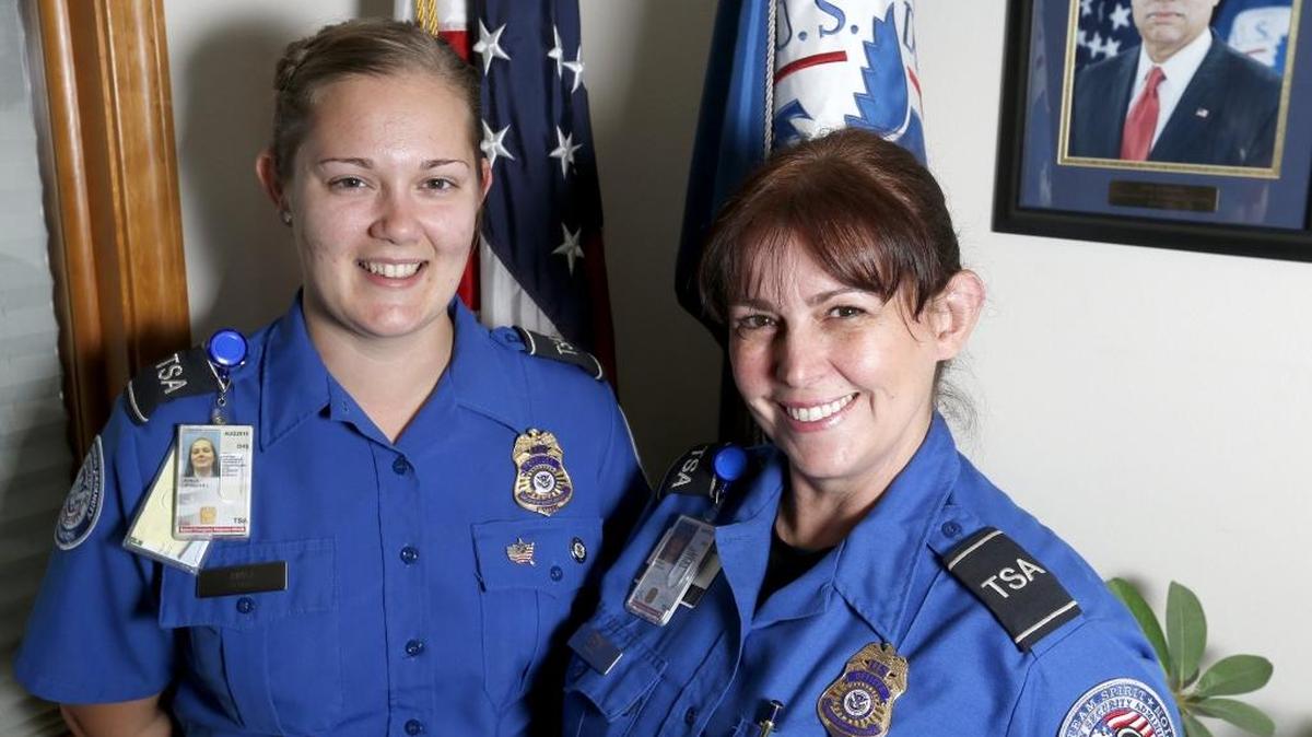 
Transportation Security Administration officers Jennifer Ayala, left, and Tonya Koski, who both work at the Tri-Cities Airport, pose Wednesday at the department’s offices in Pasco. They were among 1,500 TSA officers who helped provide security during Pope Francis’ visit to Philadelphia. See a video at www.tricityherald.com. 
