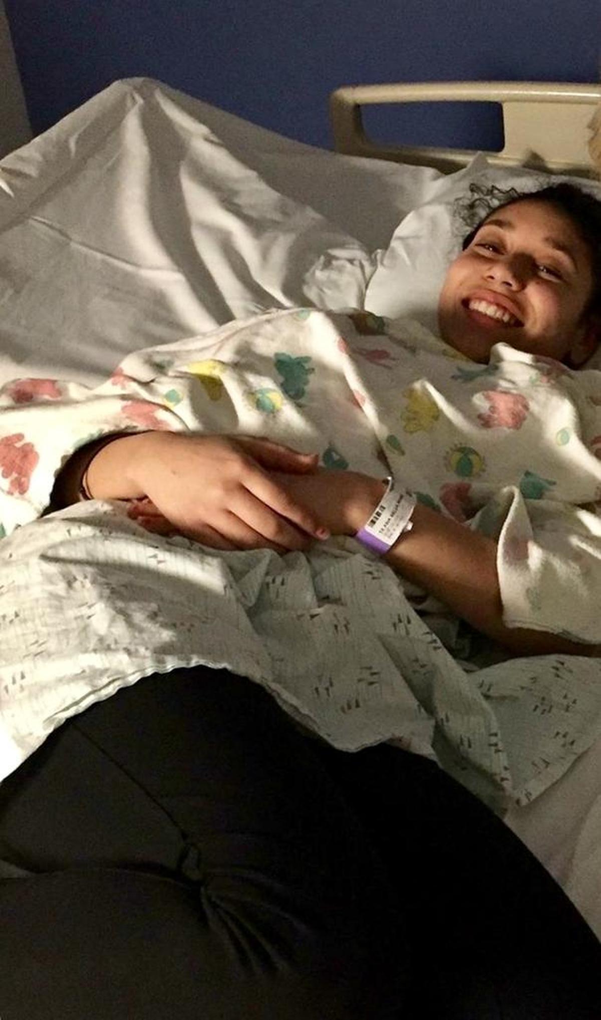 Asia, still smiling after her first round of chemotherapy.