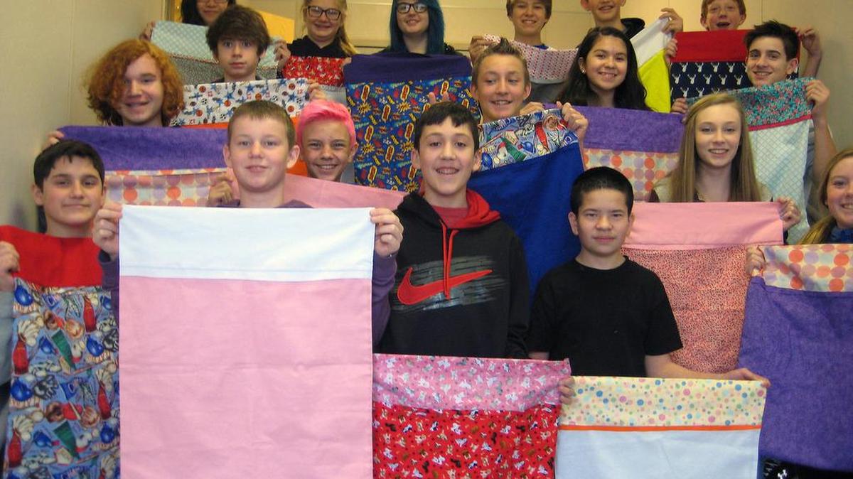 Carmichael Middle School’s eighth-grade family and consumer science students sewed pillowcases for Safe Harbor, a crisis support center for local families.