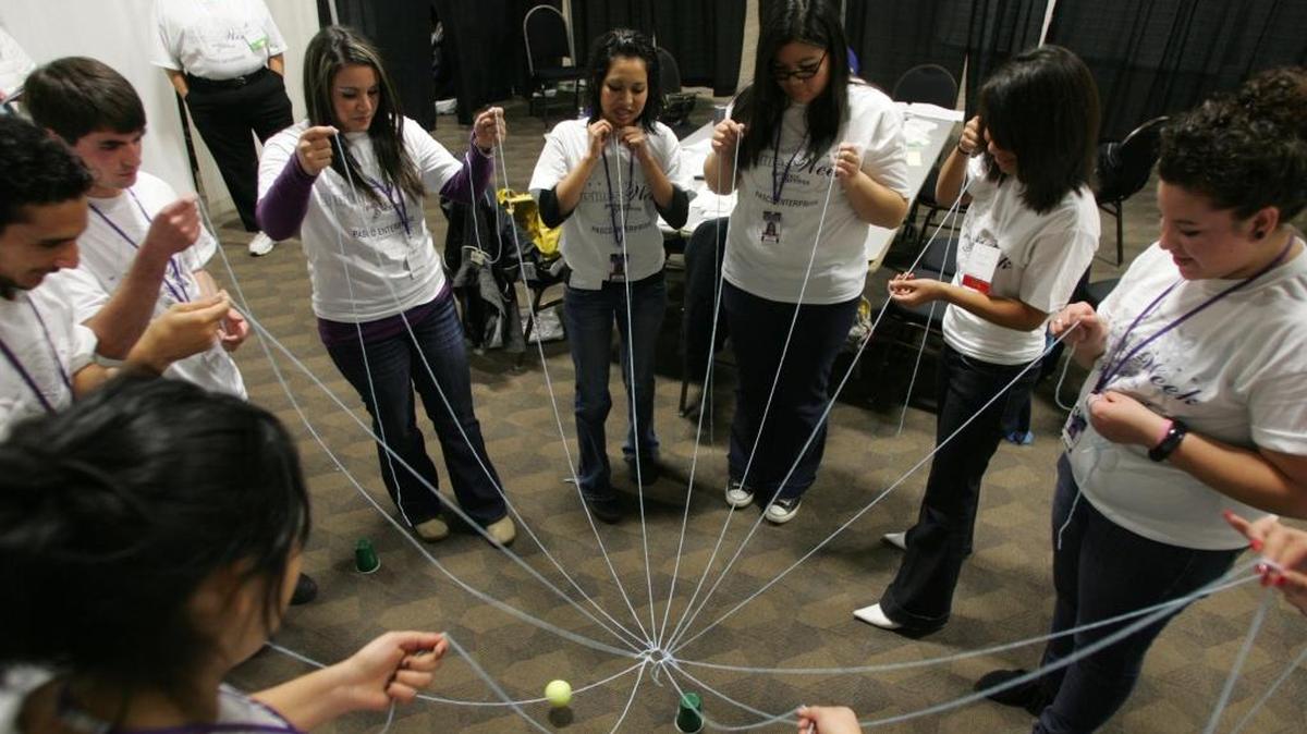 Pasco High School students perform a group exercise designed to promote a sense of teamwork during Enterprise Week in 2009.