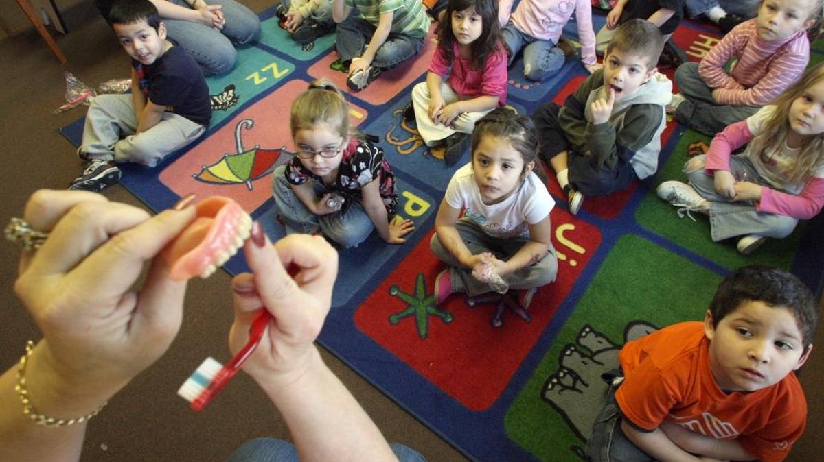 The Pasco School District received $300,000 from the state to go toward building a $2.5 million preschool center. This file photo shows preschoolers getting a brushing lesson at the Boys & Girls Club of Benton and Franklin Counties in Pasco.