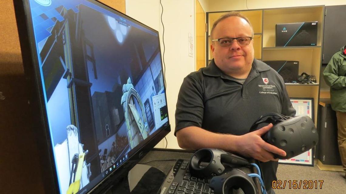 Jonah Firestone, an assistant professor of science education at Washington State University Tri-Cities, shows some of the equipment at the school’s new virtual reality learning lab at the Richland campus.