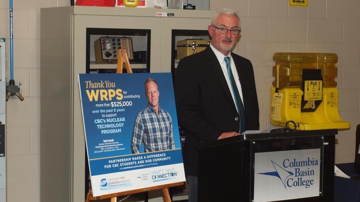 Washington River Protection Solutions President Mark Lindholm speaks during a presentation for a $33,500 donation.