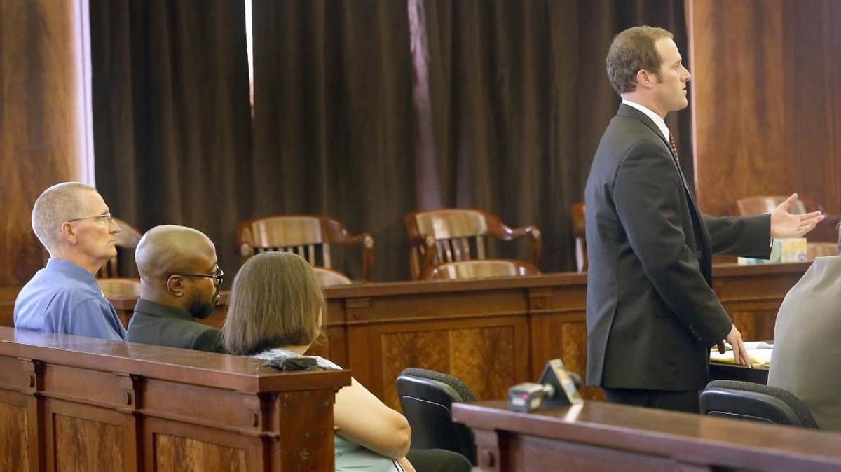 
Attorney Tyler Hinckley makes his case against sanctions against individual board members of the Pasco Association of Educators during Friday’s hearing before Judge Alex Ekstrom in Franklin County Superior Court. Seated behind Hinckley, from left, are: union president Greg Olson, and union board members Andre Wren and Debbie Kibling.
