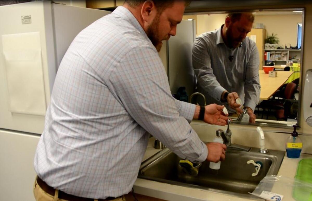 Ryan Mathews with Fulcrum Environmental Consulting demonstrated the sampling process.