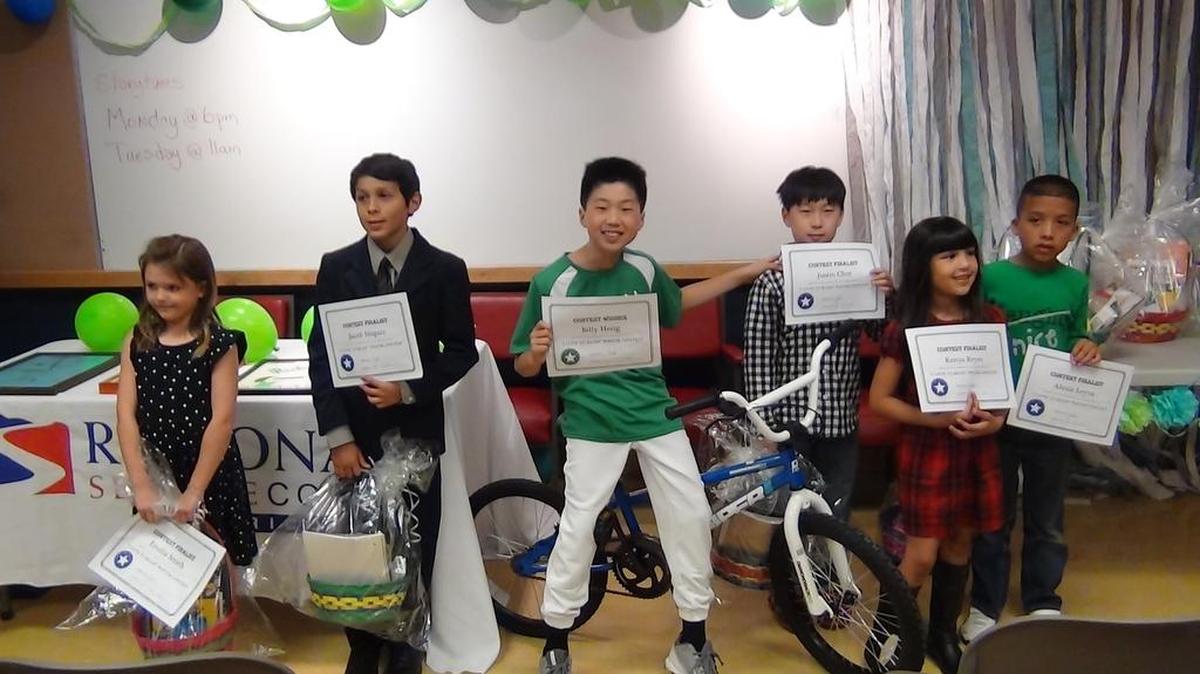 Emilia Smith, from left, Jacob Iñiquez, Billy Hong, Justin Choi, Kenya Reyes, Alexis Leyva were winners in the Regional Service Corps-AmeriCorps’ I Love to Read poster contest.