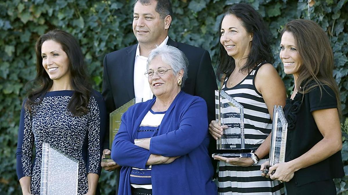 
Virginia Howard stands with her children for a family portrait after receiving Columbia Basin College’s Outstanding Alumni award for 2015-16 during Wednesday’s annual faculty and staff gathering in the college’s theater. From left, they are: Jeanene Landby, Joe Howard, Jonna Mayfield and Judy Brown.
