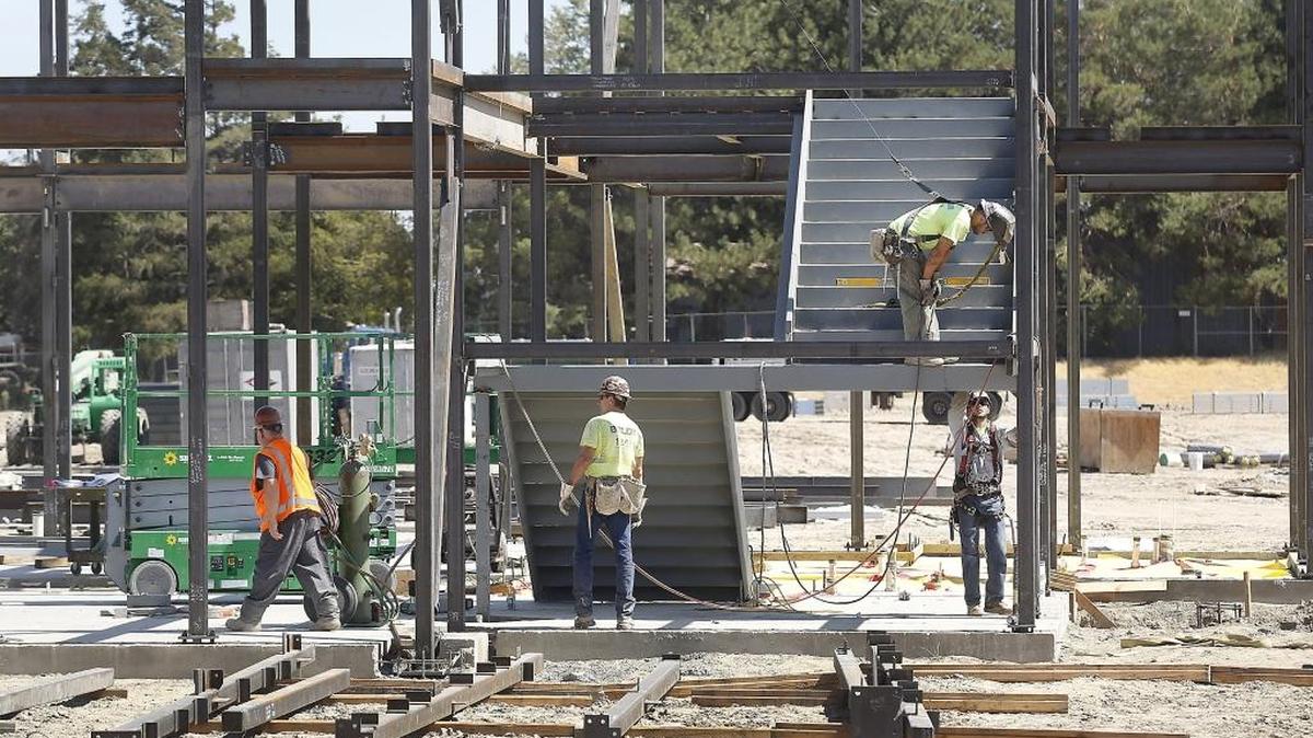 Workers install a staircase Thursday at the Kennewick School District’s new dual language elementary school at 6011 W. 10th Place. The school will be 66,000-square-feet and have 30 classrooms. Tri-City native Jaime Silva will be the principal when it opens in August 2018 at the former site of Desert Hills Middle School.