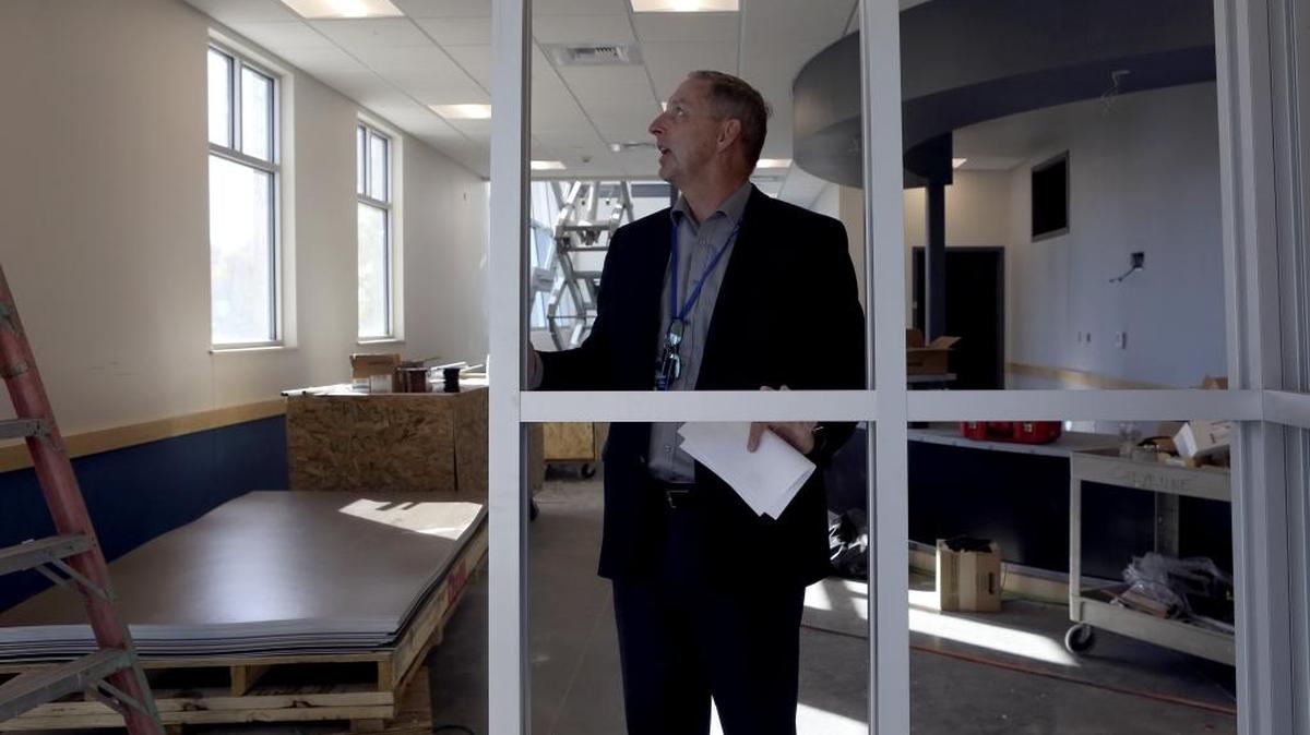 Education Service District 123 Superintendent Darcy Weisner stands in the lobby during a tour of the agency's expansion at it's Pasco headquarters. See a video at www.tricityherald.com.