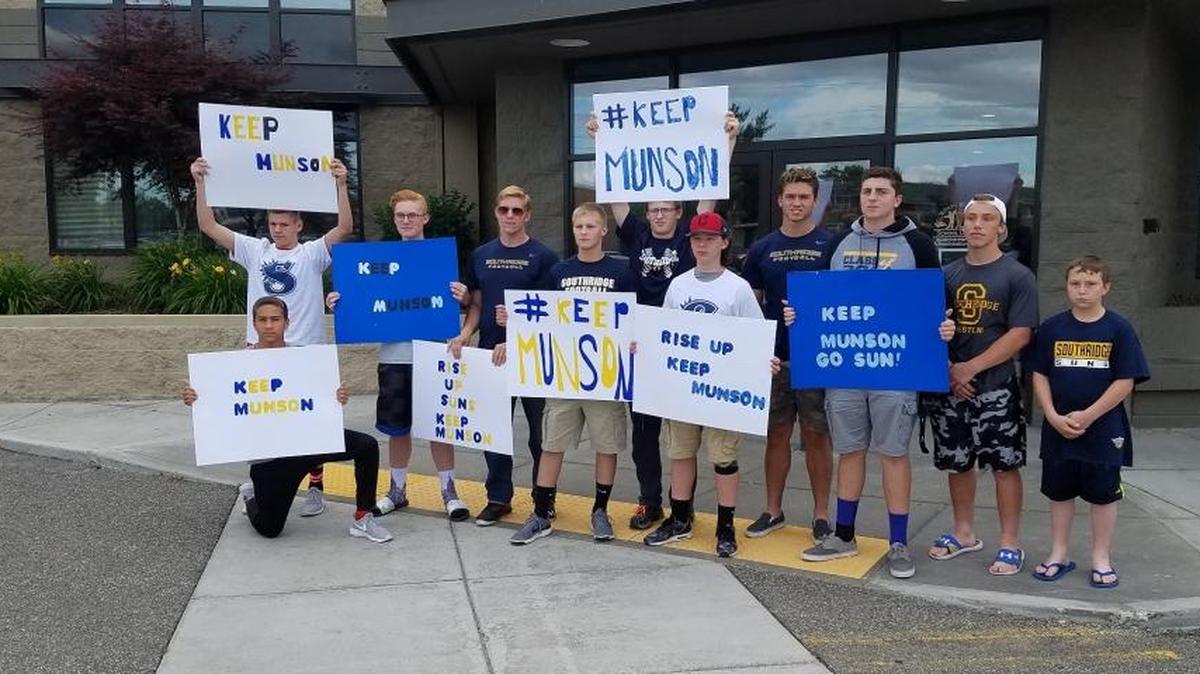 Some Southridge students brought signs to the Kennewick School Board meeting Wednesday in hopes of keeping their football coach, Keith Munson. The board voted not to renew his teaching contract, though he still has a coaching contract.