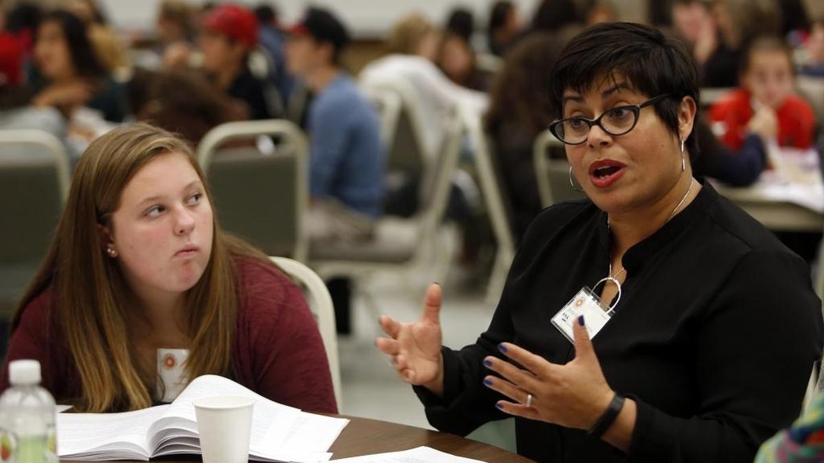 Aydri Turnbull, an eighth-grader at Horse Heaven Hills Middle School, looks on as King County Superior Court Judge Veronica Alicea Galván, originally of Pasco, leads a discussion Friday during the annual Tri-Cities Youth and Justice Forum at Columbia Basin College. More than 200 area students in eighth through 12th grade attended the forum to showcase career opportunities within the justice system.