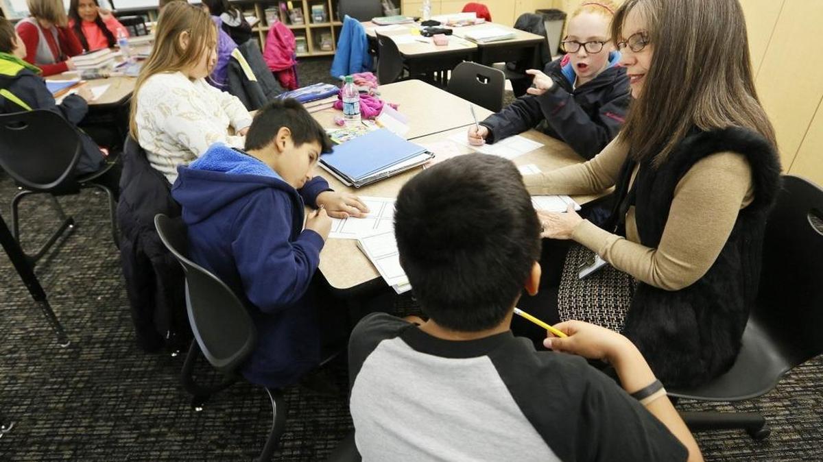 Denise Hogg, the Kennewick Education Association president, said the union is concerned about the state senate’s plan to funding basic education. The English Language Learner specialist works here with students at Lincoln Elementary School in Kennewick.