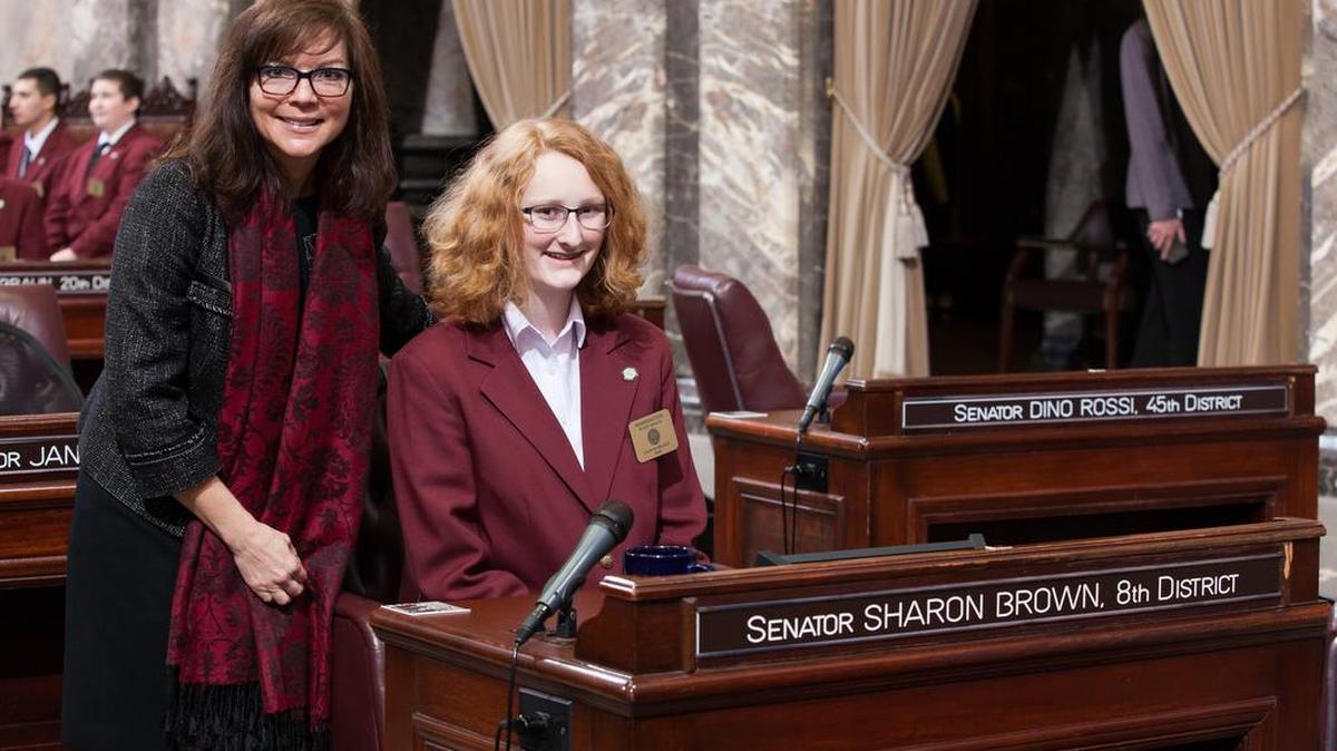 Sen. Sharon Brown, R-Kennewick, stands with page Canon Briggs at the capitol in Olympia.