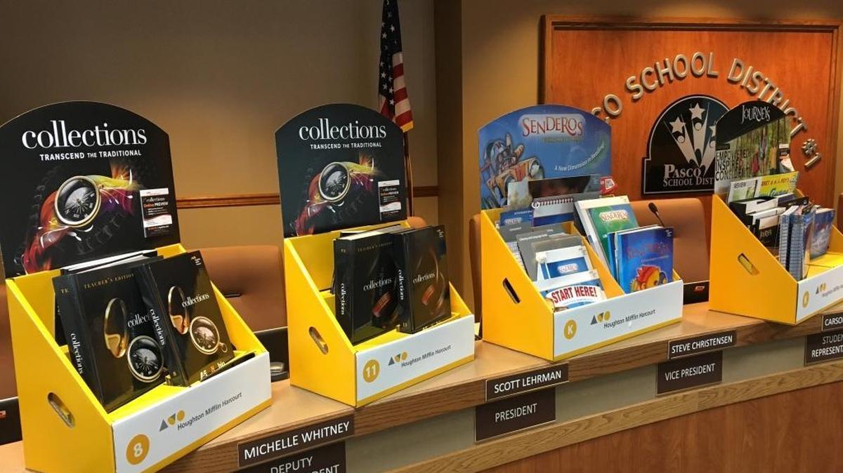 Sample copies of the recommended language arts textbooks for Pasco schools were displayed during a recent Pasco School Board meeting.