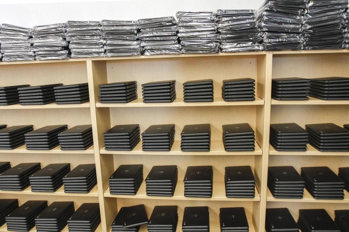 About 700 Google Chrome notebooks sit inside the library at Leona Libby Middle School in Richland. The notebooks will be given to students to use in class and at home.