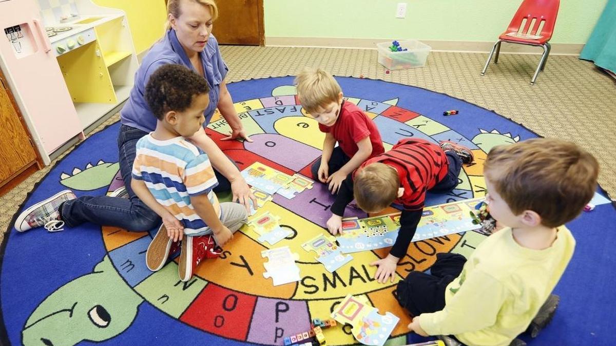 Tosha Phillis teaches at the YMCA preschool in 2014. Early learning advocates have said that the earliest years of life, from birth to 3 years old, are crucial in developing literacy as well as social and critical thinking skills.