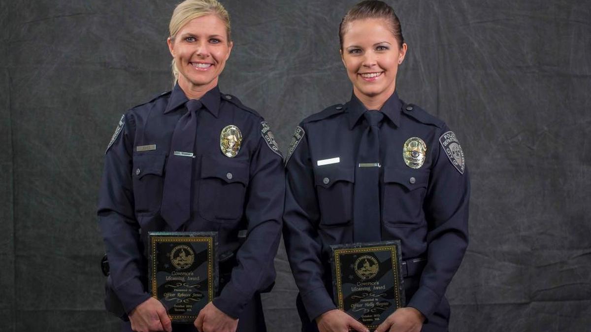 
Rebecca Jones, left, and Holly Baynes of the Kennewick Police Department received the Washington state Governor’s Lifesaving Award. 
