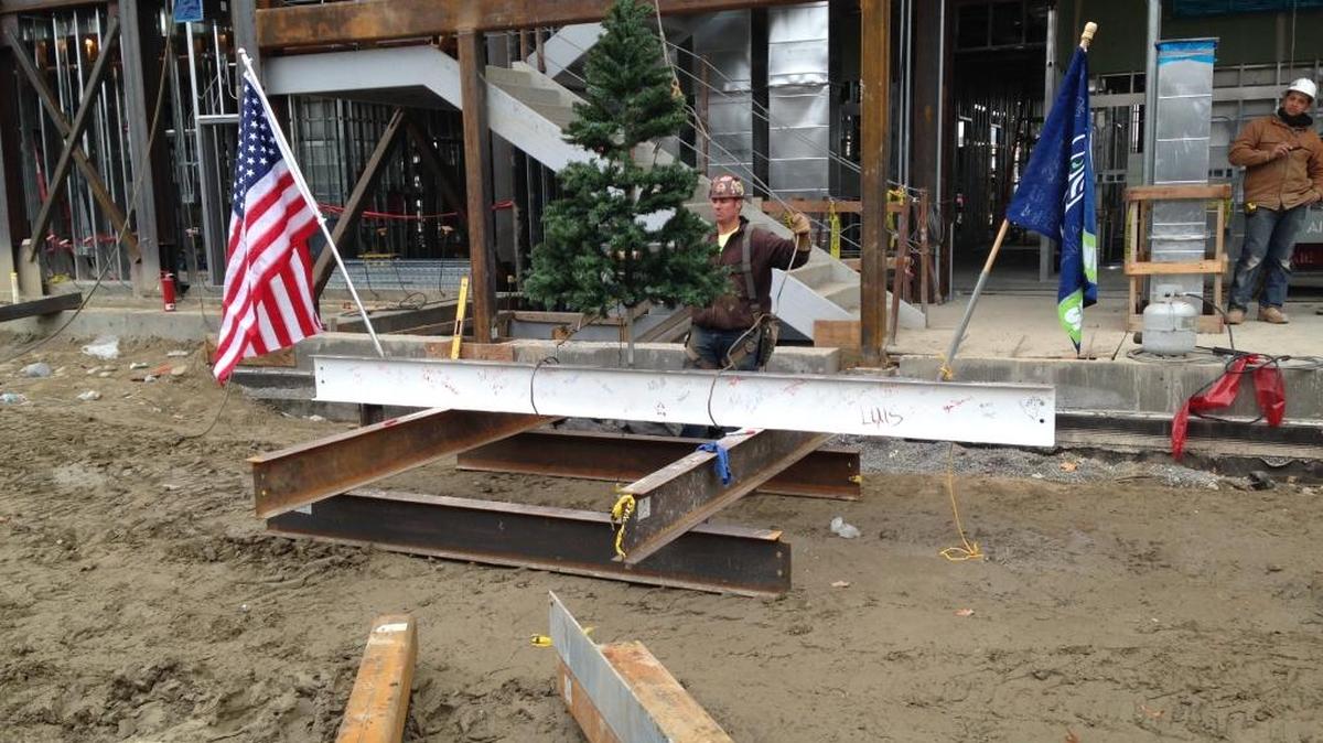 The uppermost beam was placed on top of the Wortman Medical Science Center on Friday. The building is scheduled to open in 2017.
