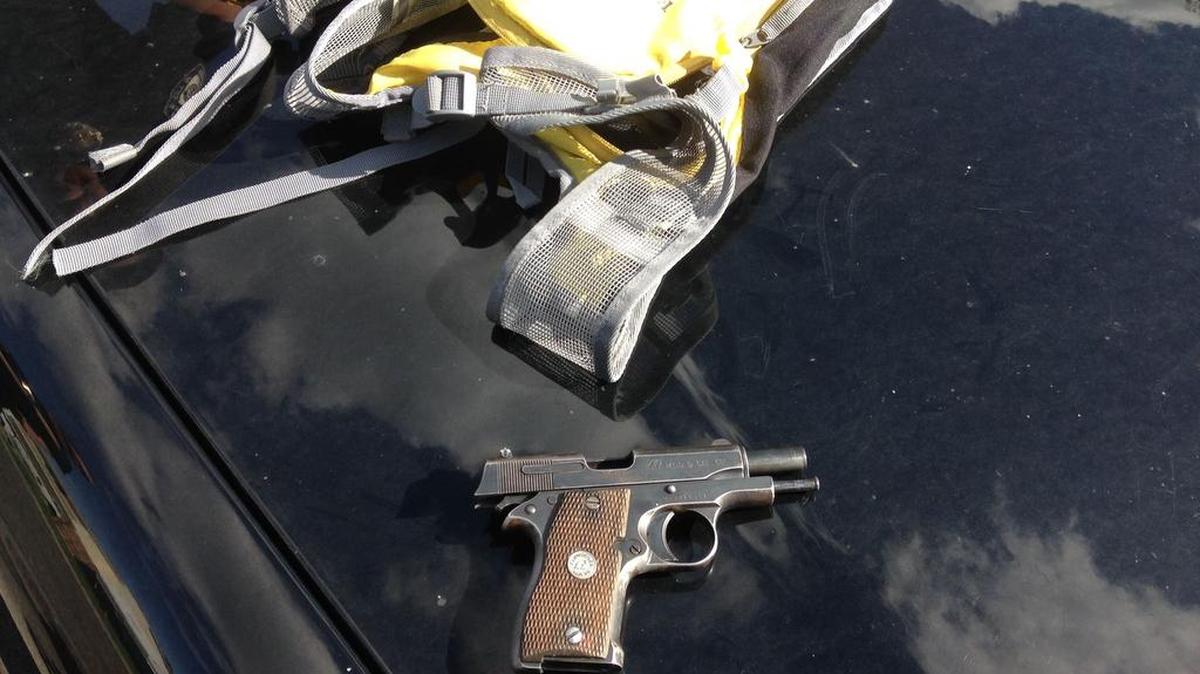 The gun found on a man who allegedly entered an unlocked Kennewick home Friday where a 13-year-old boy was home alone.